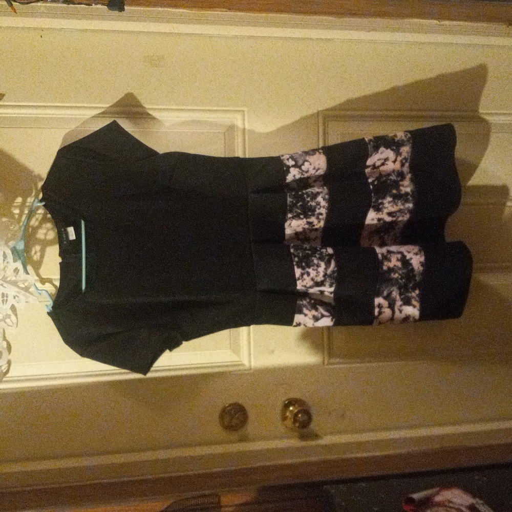 Short black dress.